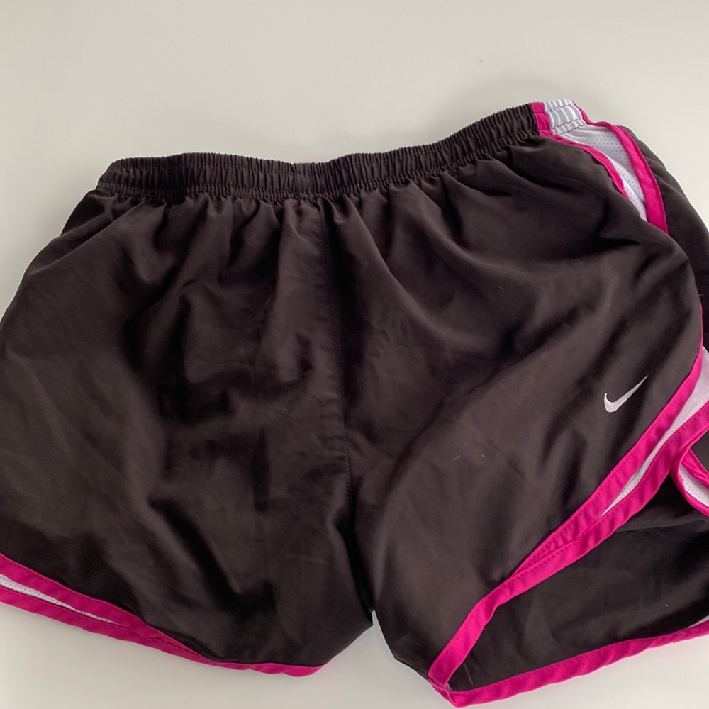 pink and black Nike shorts